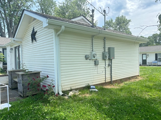 400 Circle Dr, Estill Springs, TN 37330 - view of side of home featuring a yard and a shingled roof