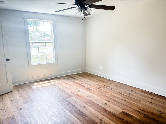 400 Circle Dr, Estill Springs, TN 37330 - spare room featuring ceiling fan, wood finished floors, and baseboards