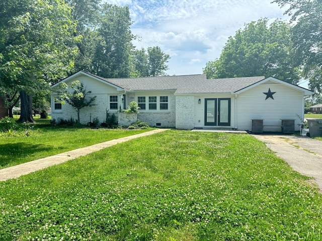 400 Circle Dr, Estill Springs, TN 37330 - ranch-style home featuring french doors, a front lawn, brick siding, and central AC unit