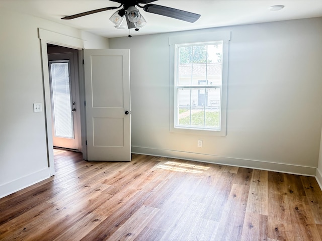 400 Circle Dr, Estill Springs, TN 37330 - unfurnished room with ceiling fan, baseboards, and wood finished floors