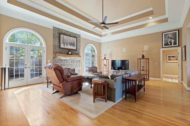 1130 Crater Hill Dr, Nashville, TN 37215 - living room featuring plenty of natural light, french doors, light wood-style floors, a ceiling fan, and crown molding