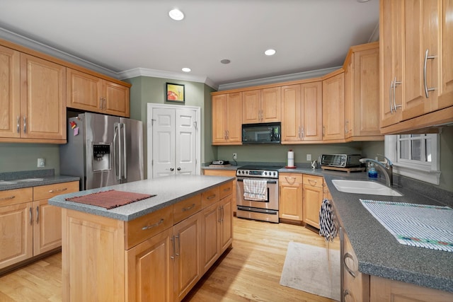 1130 Crater Hill Dr, Nashville, TN 37215 - kitchen featuring appliances with stainless steel finishes, ornamental molding, a sink, a center island, and light wood-type flooring