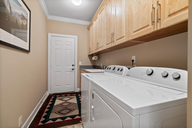 1130 Crater Hill Dr, Nashville, TN 37215 - laundry area with crown molding, washer and clothes dryer, cabinet space, and baseboards