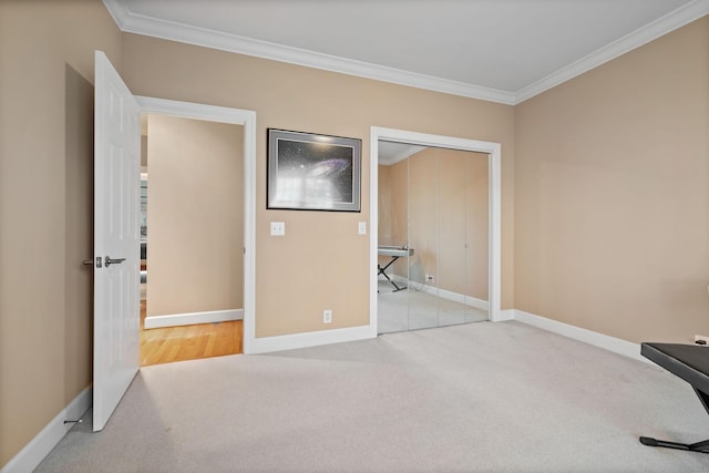 1130 Crater Hill Dr, Nashville, TN 37215 - unfurnished bedroom featuring carpet flooring, crown molding, baseboards, and a closet