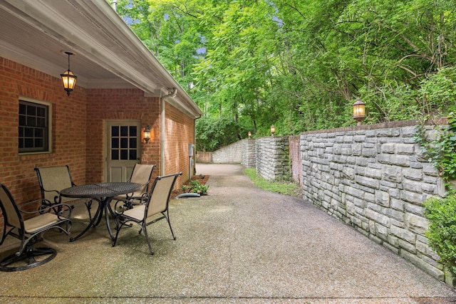 1130 Crater Hill Dr, Nashville, TN 37215 - view of patio / terrace featuring outdoor dining area and fence