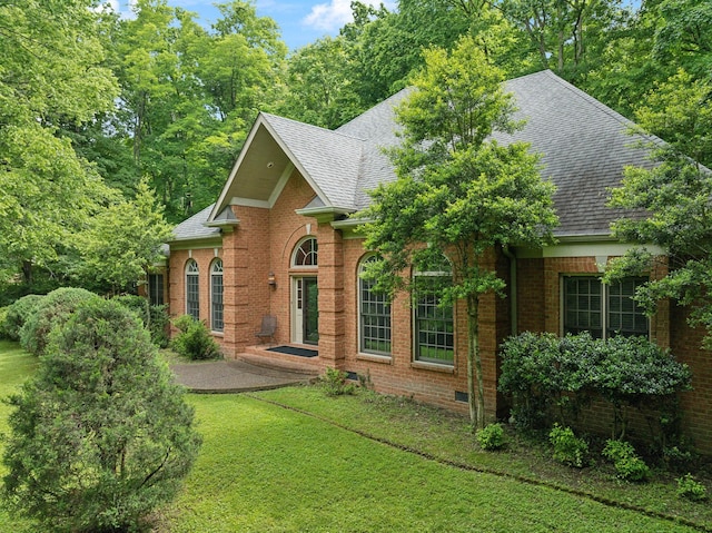 1130 Crater Hill Dr, Nashville, TN 37215 - view of front of home with roof with shingles, brick siding, and a front lawn
