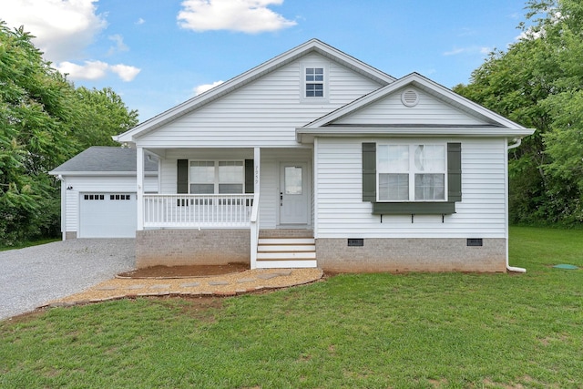 7959 Monterey Hwy, Sparta, TN 38583 - bungalow featuring a porch, crawl space, an attached garage, gravel driveway, and a front yard