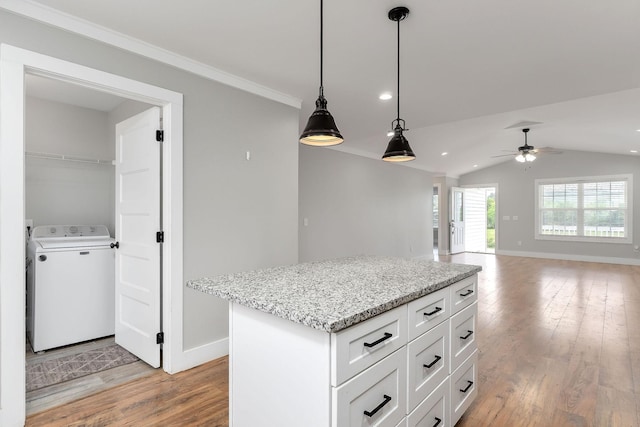 7959 Monterey Hwy, Sparta, TN 38583 - kitchen with washer / clothes dryer, light wood-style flooring, a ceiling fan, white cabinets, and baseboards