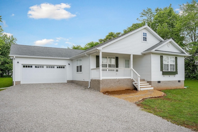 7959 Monterey Hwy, Sparta, TN 38583 - view of front of house with driveway, covered porch, an attached garage, crawl space, and a front yard