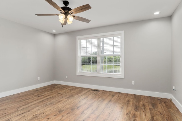 7959 Monterey Hwy, Sparta, TN 38583 - empty room with baseboards, wood finished floors, ceiling fan, and recessed lighting
