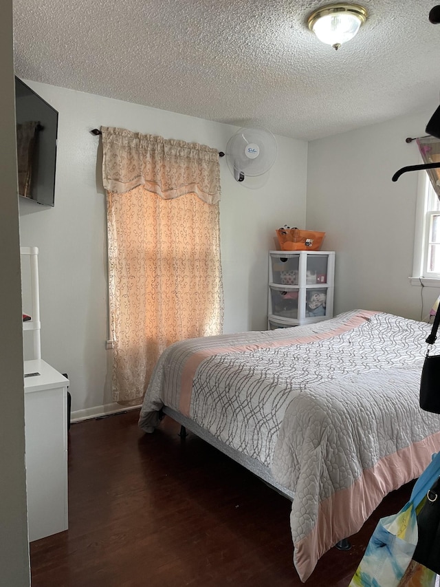 438 Tampa Dr, Nashville, TN 37211 - bedroom with wood finished floors and a textured ceiling