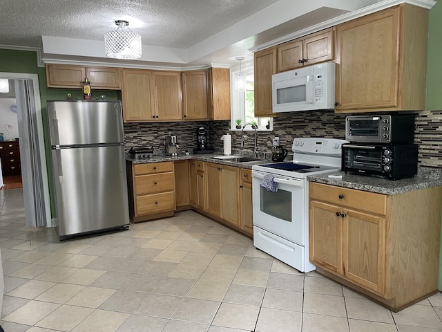438 Tampa Dr, Nashville, TN 37211 - kitchen featuring white appliances, a sink, decorative backsplash, a textured ceiling, and dark stone countertops
