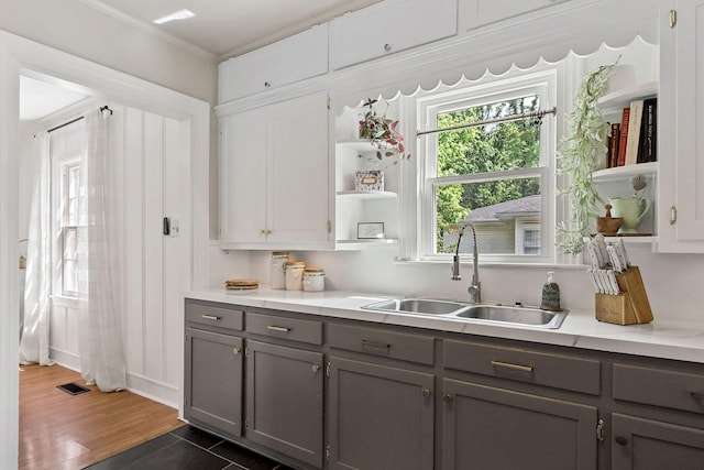 36 Hillcrest Dr, Sparta, TN 38583 - kitchen with gray cabinets, open shelves, a sink, ornamental molding, and light countertops