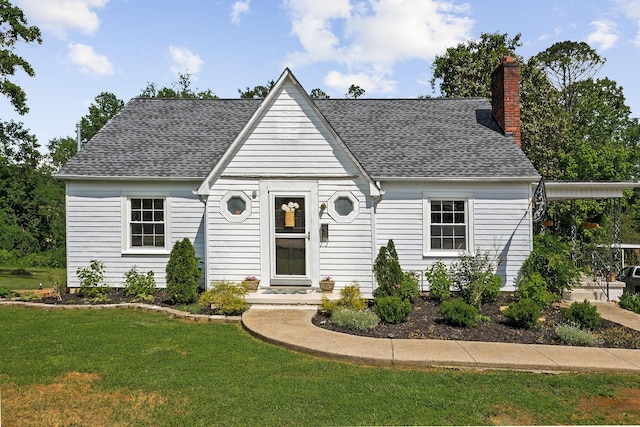 36 Hillcrest Dr, Sparta, TN 38583 - view of front of property featuring a chimney, a front lawn, and a shingled roof