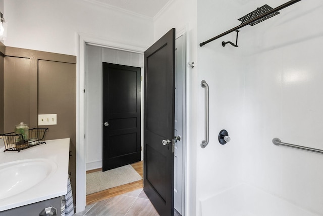 36 Hillcrest Dr, Sparta, TN 38583 - full bathroom featuring a shower, ornamental molding, vanity, and wood finished floors