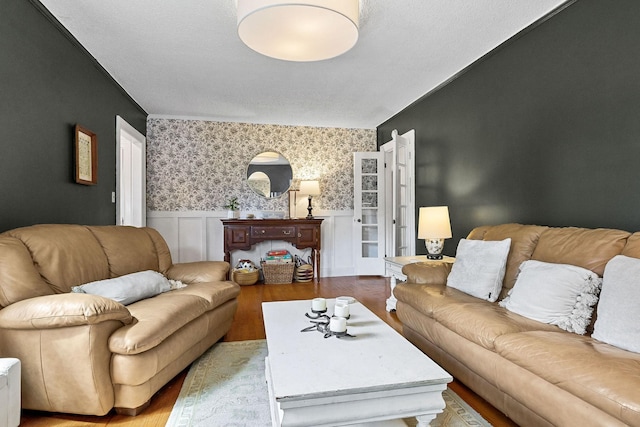 36 Hillcrest Dr, Sparta, TN 38583 - living room with wood finished floors, wainscoting, and wallpapered walls