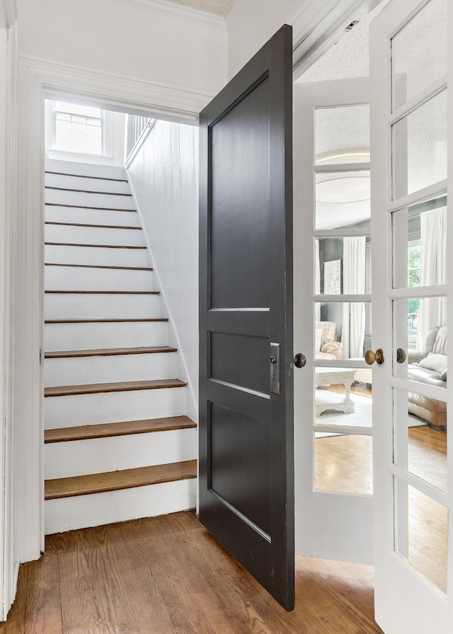 36 Hillcrest Dr, Sparta, TN 38583 - stairs featuring healthy amount of natural light, wood finished floors, french doors, and ornamental molding