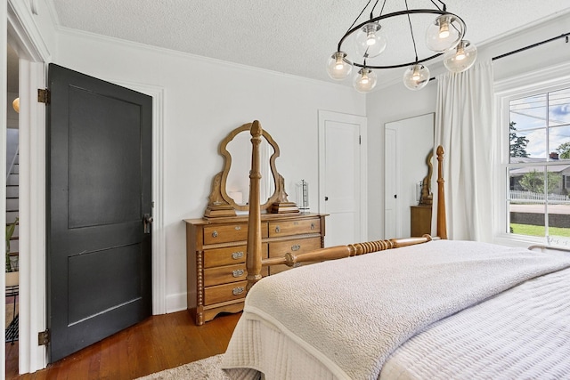 36 Hillcrest Dr, Sparta, TN 38583 - bedroom featuring ornamental molding, wood finished floors, and a textured ceiling