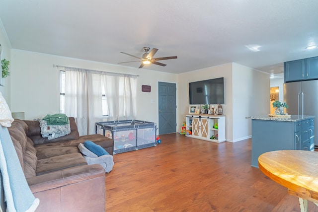 1689 Pleasant Ridge Rd, Huntland, TN 37345 - living room featuring ceiling fan, wood finished floors, and baseboards