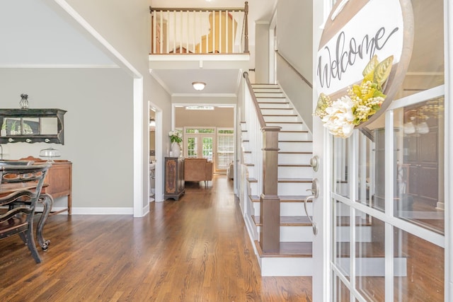 1002 Bradby Dr, Burns, TN 37029 - entryway with french doors, wood finished floors, stairway, ornamental molding, and baseboards