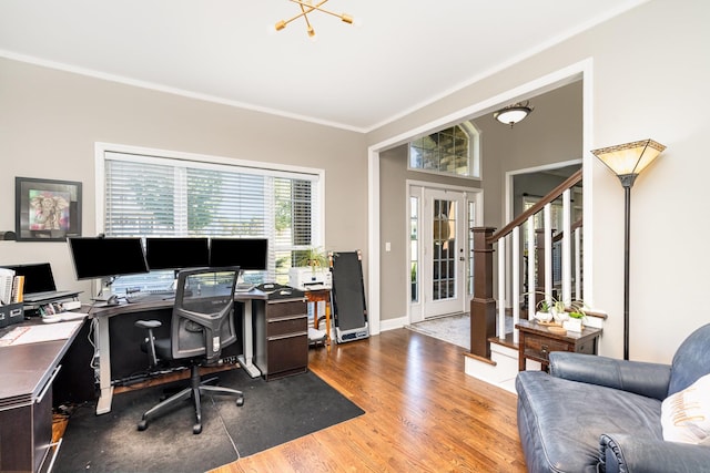 1002 Bradby Dr, Burns, TN 37029 - office area with wood finished floors, ornamental molding, baseboards, and a chandelier