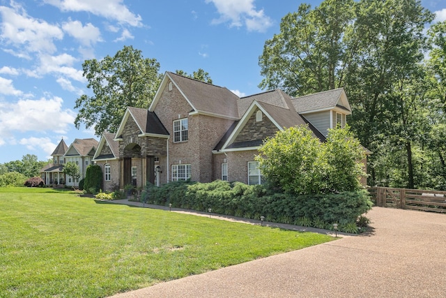 1002 Bradby Dr, Burns, TN 37029 - craftsman-style house with brick siding