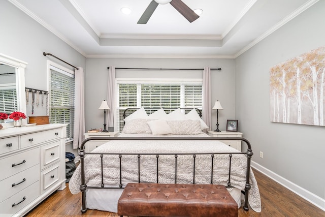1002 Bradby Dr, Burns, TN 37029 - bedroom featuring a raised ceiling, wood finished floors, baseboards, ornamental molding, and a ceiling fan
