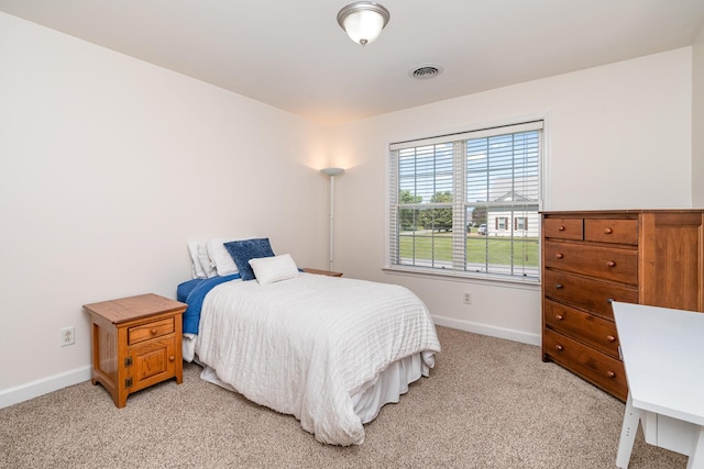 1002 Bradby Dr, Burns, TN 37029 - bedroom featuring baseboards and light carpet