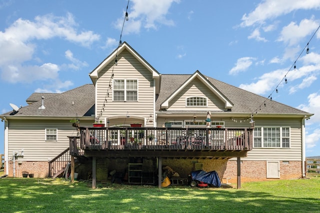 1002 Bradby Dr, Burns, TN 37029 - back of property featuring a deck, a lawn, stairs, and a shingled roof