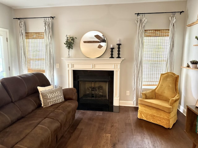 107 Auxley Ct, White House, TN 37188 - living room featuring dark wood-style floors, a fireplace with flush hearth, and baseboards