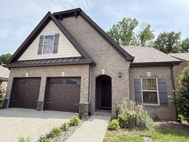 107 Auxley Ct, White House, TN 37188 - french country inspired facade featuring driveway, a garage, brick siding, a standing seam roof, and a shingled roof