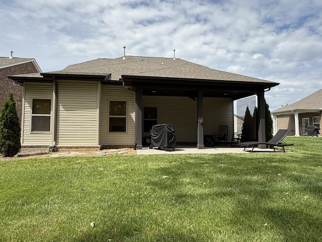 107 Auxley Ct, White House, TN 37188 - rear view of house featuring a patio area, a yard, a ceiling fan, and a shingled roof