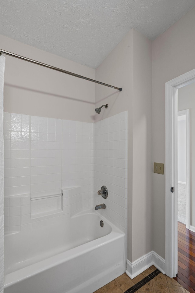 612 Churchill Xing, Madison, TN 37115 - full bathroom featuring baseboards, shower / bath combo, tile patterned floors, and a textured ceiling
