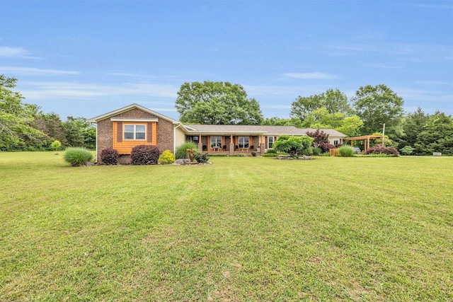 single story home featuring a front lawn and brick siding