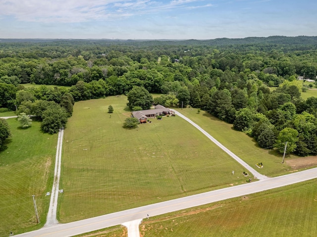 overview of rural landscape with a heavily wooded area