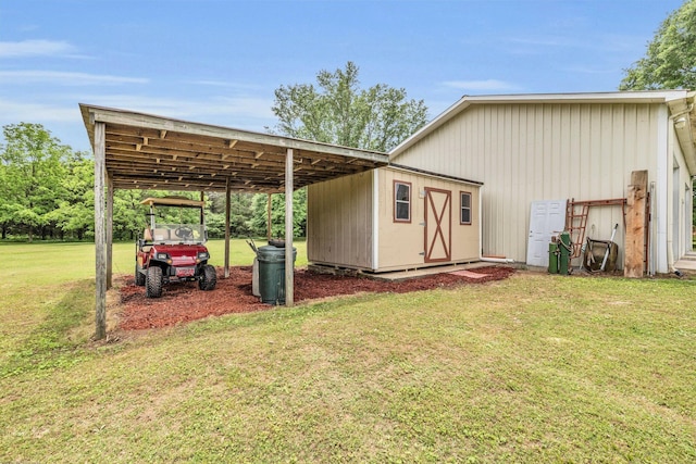 view of outbuilding featuring a carport and an outbuilding