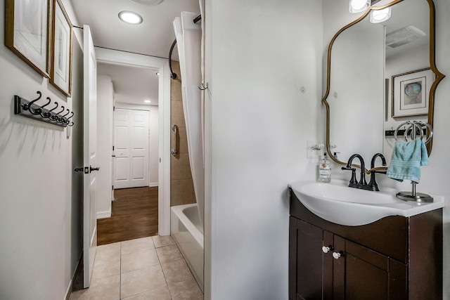 819 N Jefferson Ave, Cookeville, TN 38501 - bathroom with tile patterned floors, vanity, and shower / bath combination