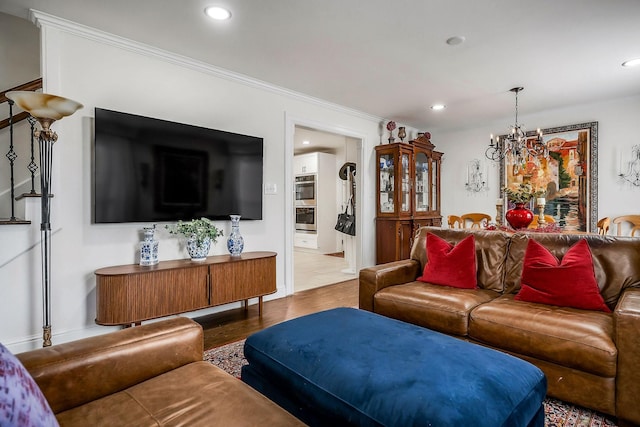 819 N Jefferson Ave, Cookeville, TN 38501 - living room featuring a chandelier, wood finished floors, recessed lighting, and crown molding