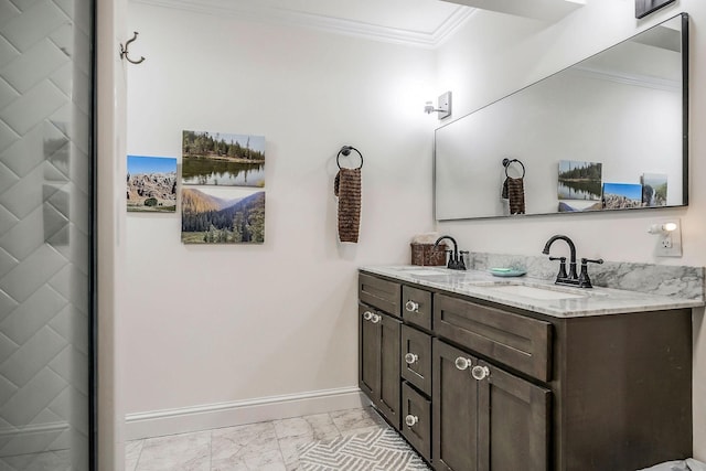 819 N Jefferson Ave, Cookeville, TN 38501 - bathroom with ornamental molding, marble finish flooring, baseboards, and double vanity