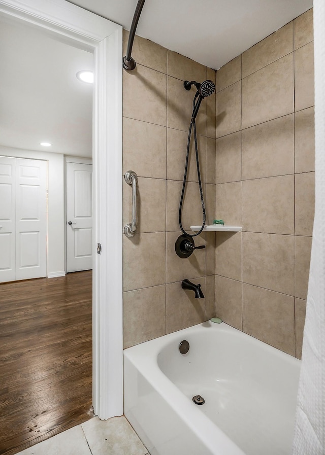 819 N Jefferson Ave, Cookeville, TN 38501 - bathroom with shower / bath combination with curtain, recessed lighting, and wood finished floors