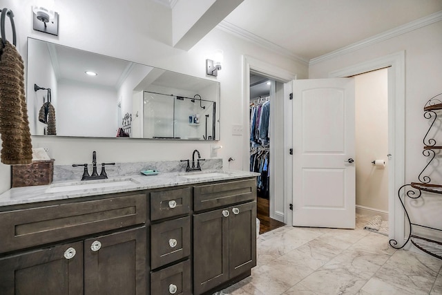 819 N Jefferson Ave, Cookeville, TN 38501 - full bathroom featuring crown molding, marble look tiles, double vanity, a walk in closet, and a stall shower
