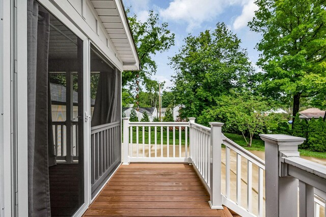 819 N Jefferson Ave, Cookeville, TN 38501 - wooden deck featuring a sunroom