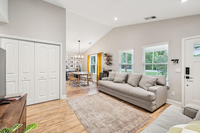 143 Two Mile Pike, Goodlettsville, TN 37072 - living area featuring vaulted ceiling, light wood-style floors, recessed lighting, a chandelier, and baseboards