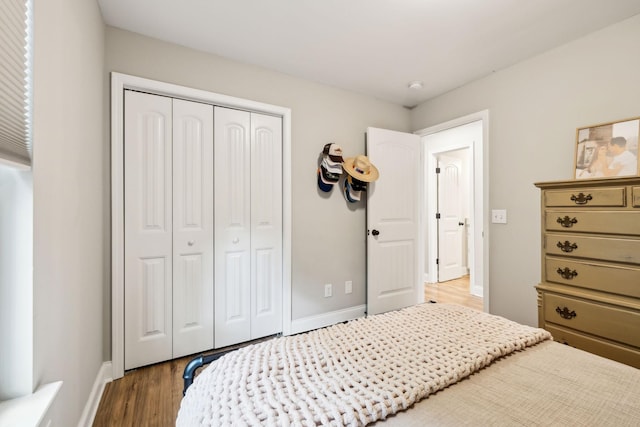 143 Two Mile Pike, Goodlettsville, TN 37072 - bedroom featuring a closet, wood finished floors, and baseboards