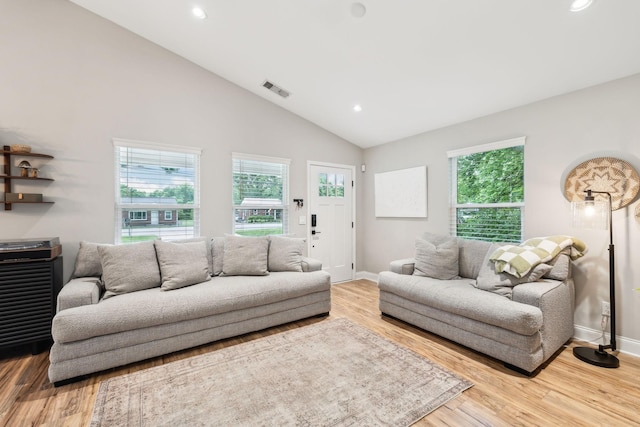 143 Two Mile Pike, Goodlettsville, TN 37072 - living room with healthy amount of natural light, vaulted ceiling, recessed lighting, wood finished floors, and baseboards