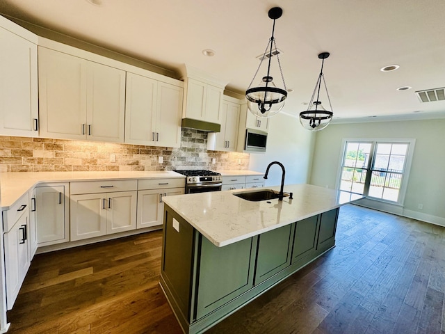 4200 Fargo Ct, Murfreesboro, TN 37127 - kitchen featuring a sink, appliances with stainless steel finishes, white cabinetry, dark wood-type flooring, and recessed lighting