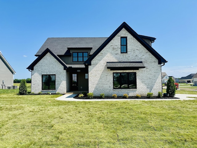 4200 Fargo Ct, Murfreesboro, TN 37127 - view of front of home with a front lawn, central AC unit, brick siding, and a shingled roof