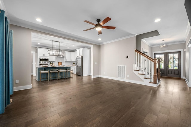 196 Knoxleigh Way, Murfreesboro, TN 37129 - unfurnished living room with stairs, a chandelier, baseboards, dark wood-style flooring, and recessed lighting