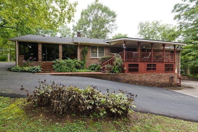 314 Powder Mill Dr, Ashland City, TN 37015 - view of front of house with brick siding and a chimney