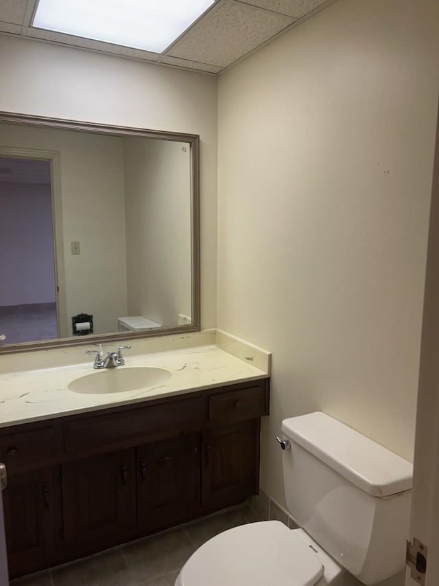 314 Powder Mill Dr, Ashland City, TN 37015 - bathroom featuring toilet, a drop ceiling, tile patterned flooring, and vanity